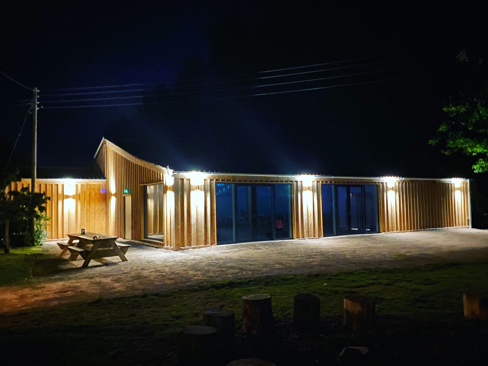 The events barn lit up at night