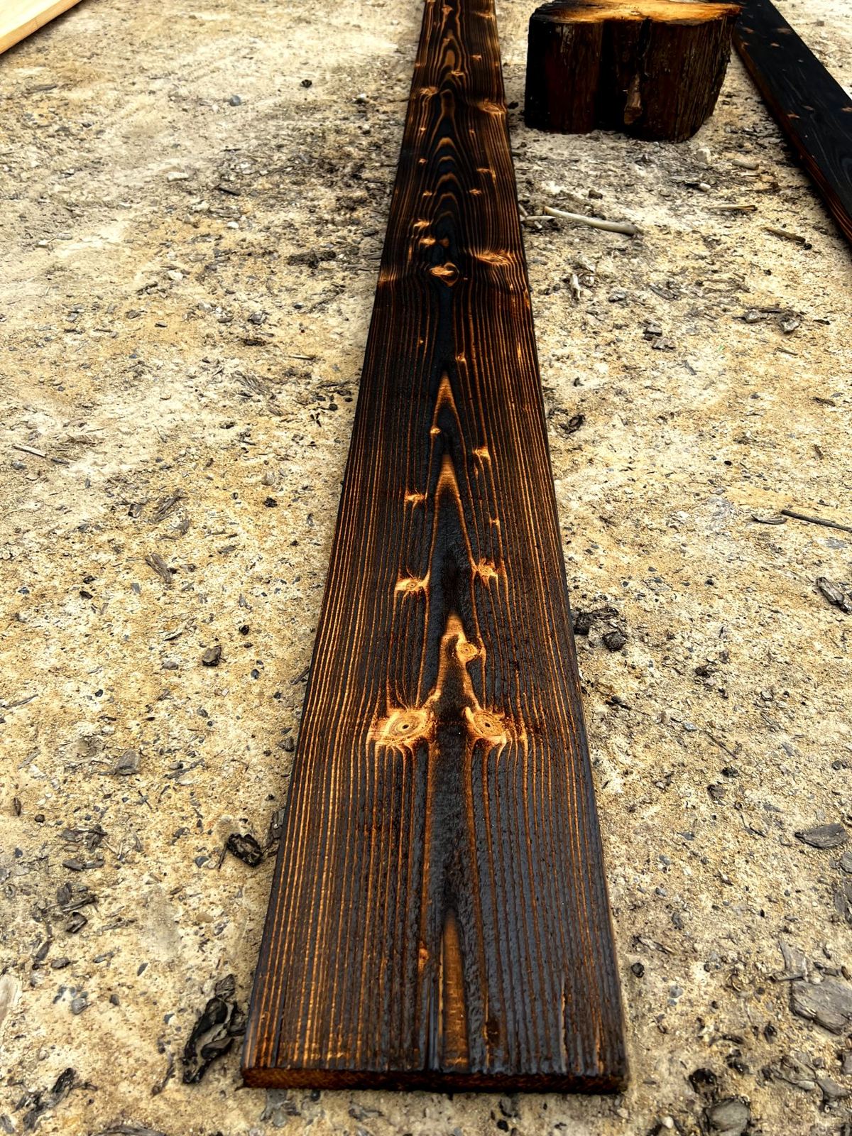 Charred board brushed back so the grain stands up